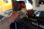 How Much to Tip a Taxi Driver – Tipping Guide 2024