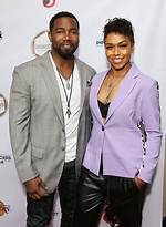 Michael Jai White's Wife Gillian Waters Stuns in Stylish Black Dress with Slit in Sweet Snap with Hu