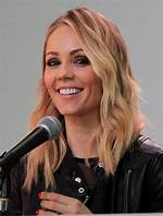 Uncover the Secrets: Laura Vandervoort's Relationships Unveiled