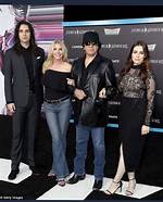 Uncovering the Height of Gene Simmons' Son